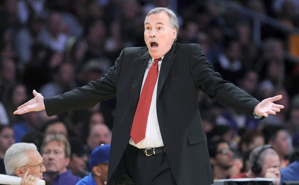 LOS ANGELES, CALIFORNIA APRIL 17, 2013-Lakers head coach Mike D'Antoni argues with a referee during a game with the Rockets at the Staples Center Wednesday. (Wally Sklaij/Los Angeles Times)